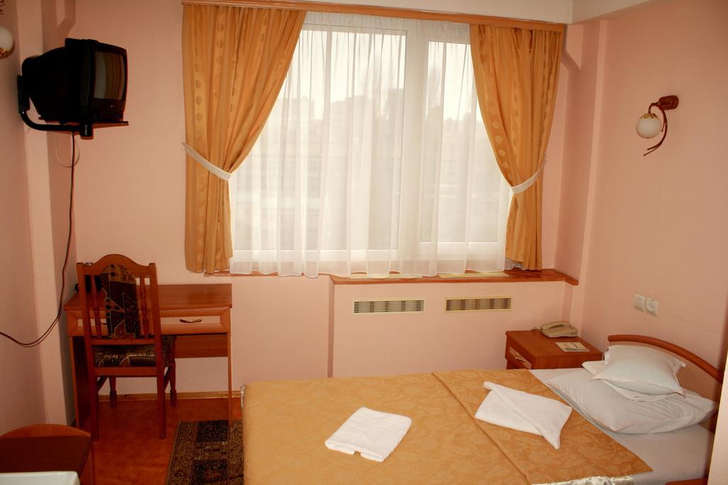 Druzhba Service Hotel Kijev Szoba fotó