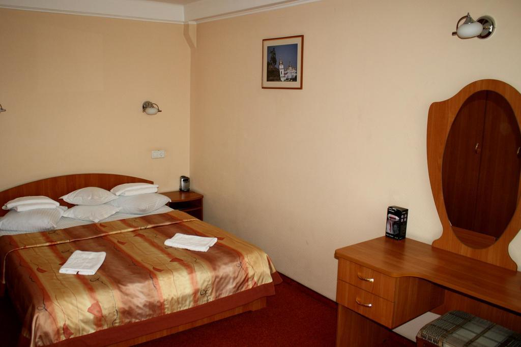 Druzhba Service Hotel Kijev Szoba fotó